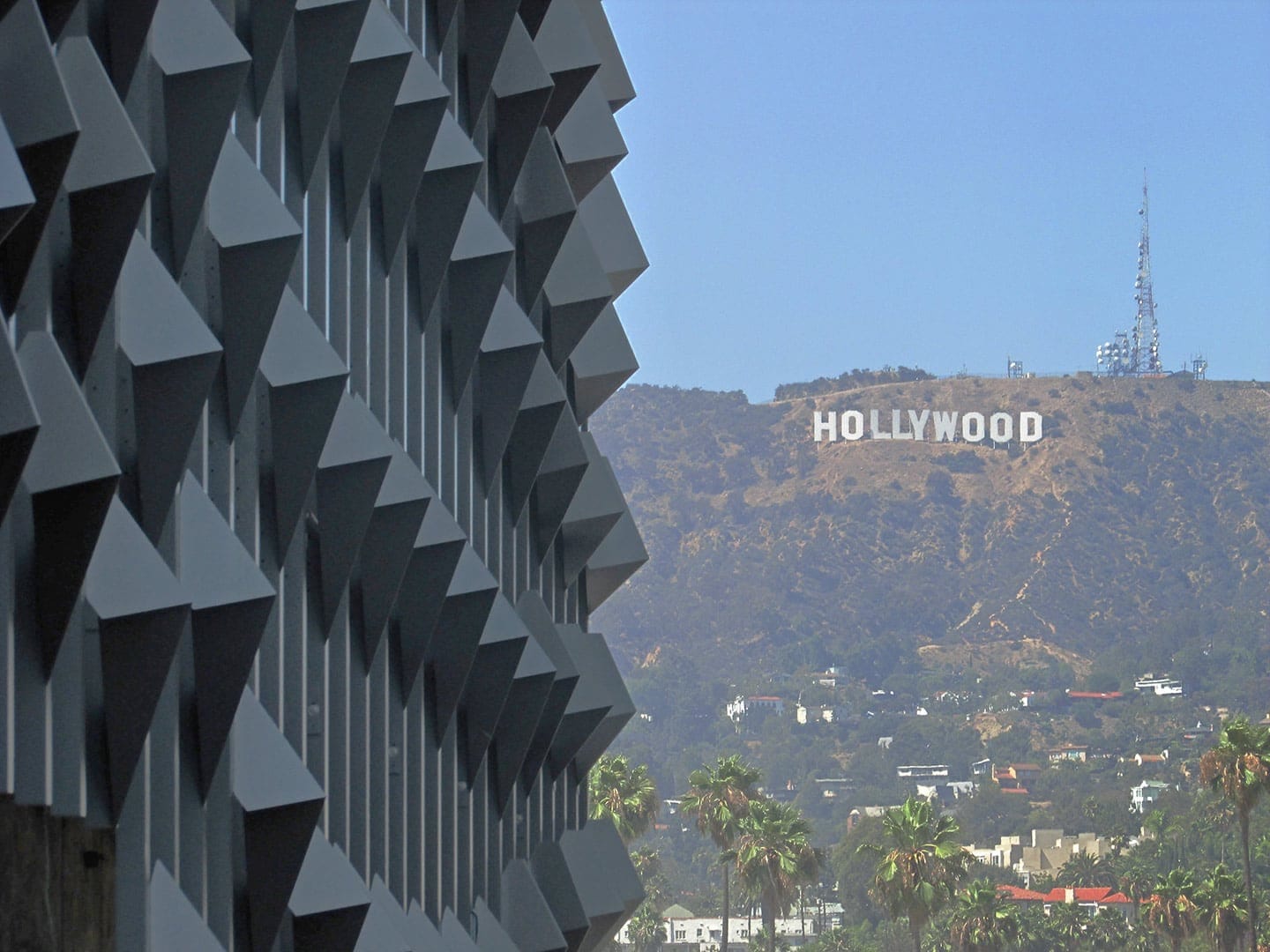 Detail of the Emerson LA facade against Hollywood Hills in California.