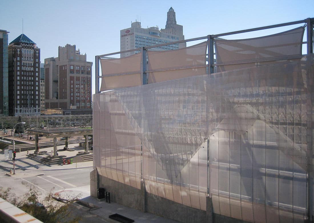 Light filters through the Winds of Aphrodite's aluminum surface on Bartle Hall Loading Dock.