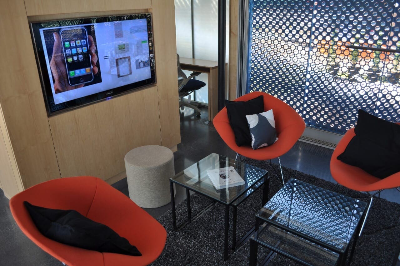 Interior photograph of the Lumenhaus showing the facade and eclipsis system video.