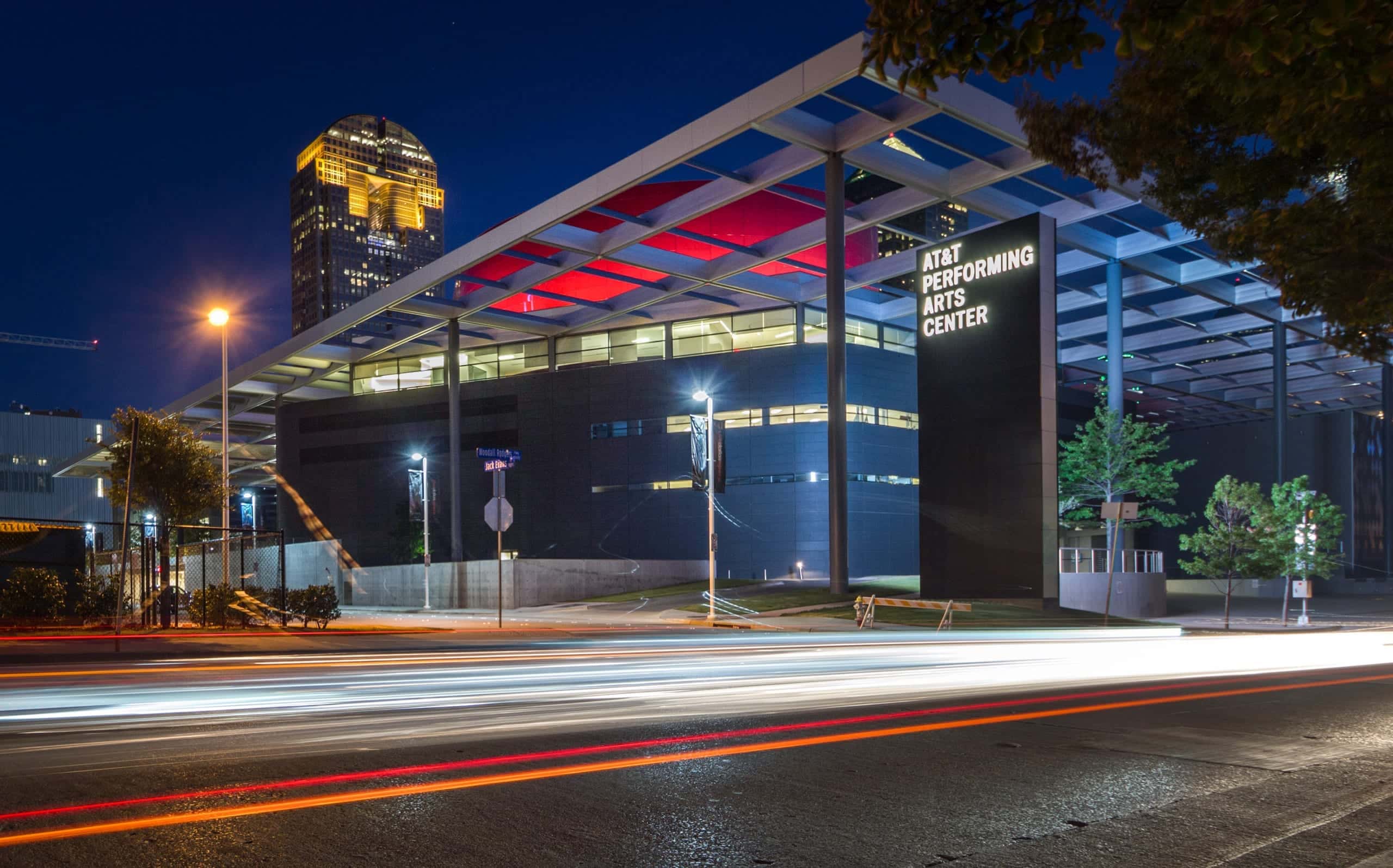 Photograph of the Winspear Opera House at night in Dallas, Texas