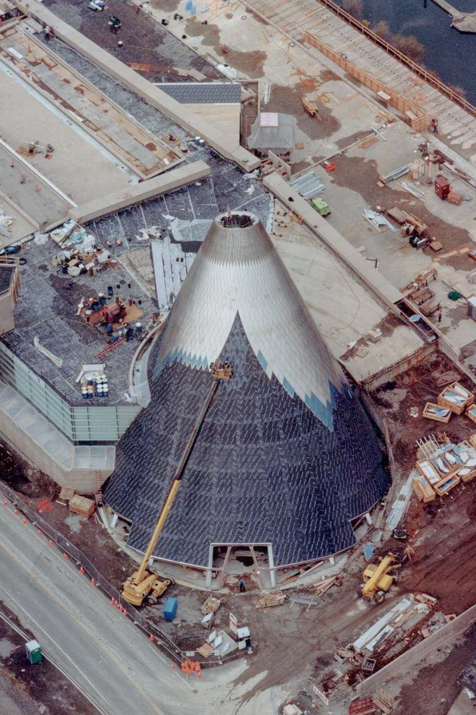 Aerial photo of the Museum of Glass during the final cladding of stainless steel across the surface