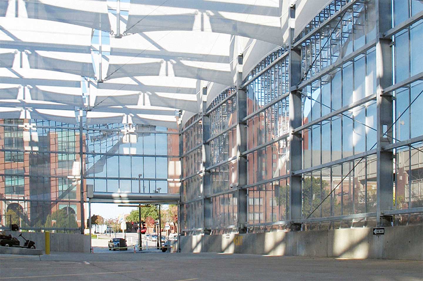 The formed expanded aluminum surface allows light to filter into the Bartle Hall Loading Dock.