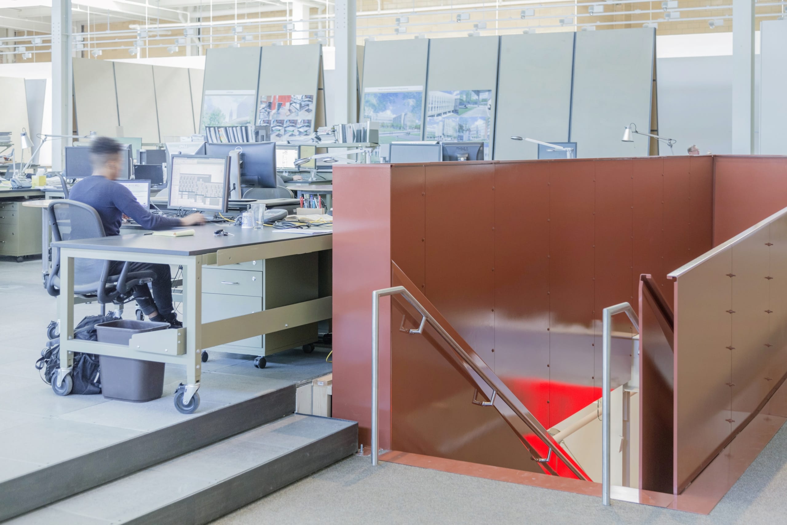 Second floor offices, showing the red-painted stairwell panels manufactured by Zahner.