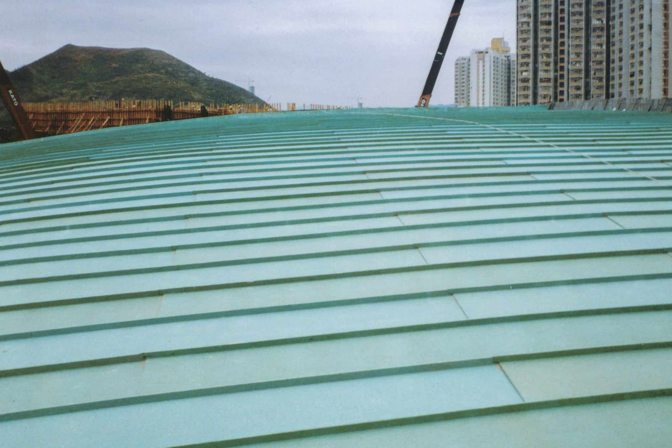 Tsing Yi Station Terminal Roof, running bond pattern on double-lock standing seam roof.