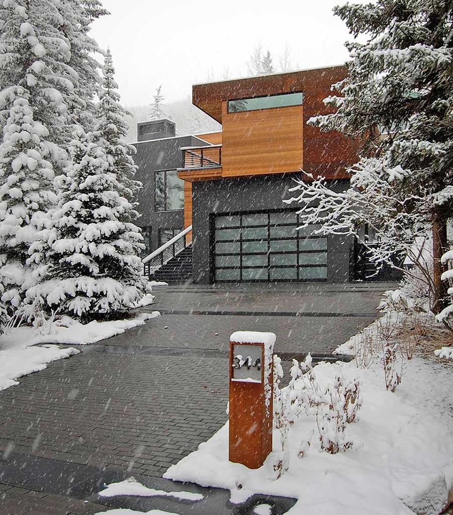 Snow falls at the Dayton Residence in Vail, Colorado.