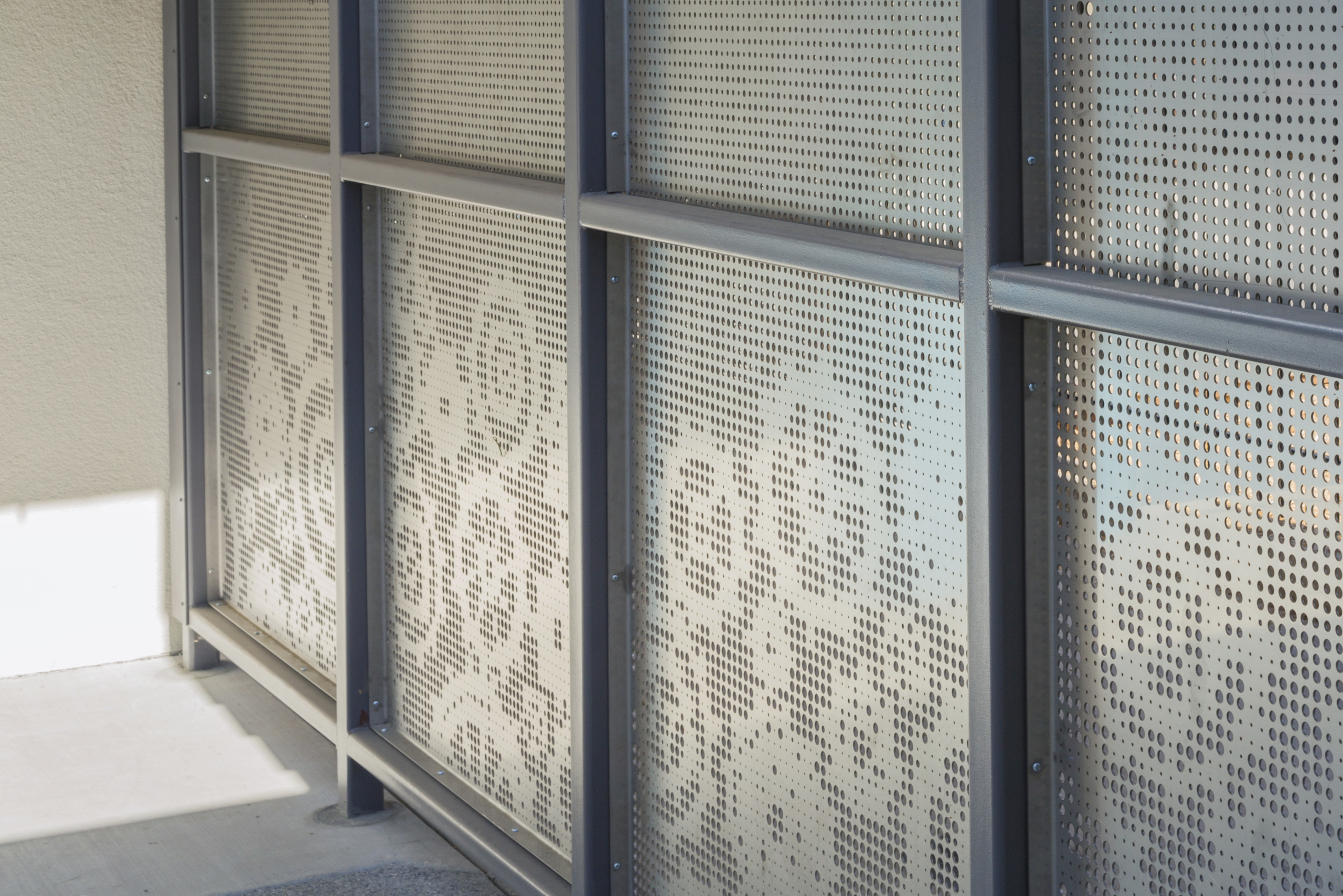 Detail of perforated stainless steel at Washington Elementary.