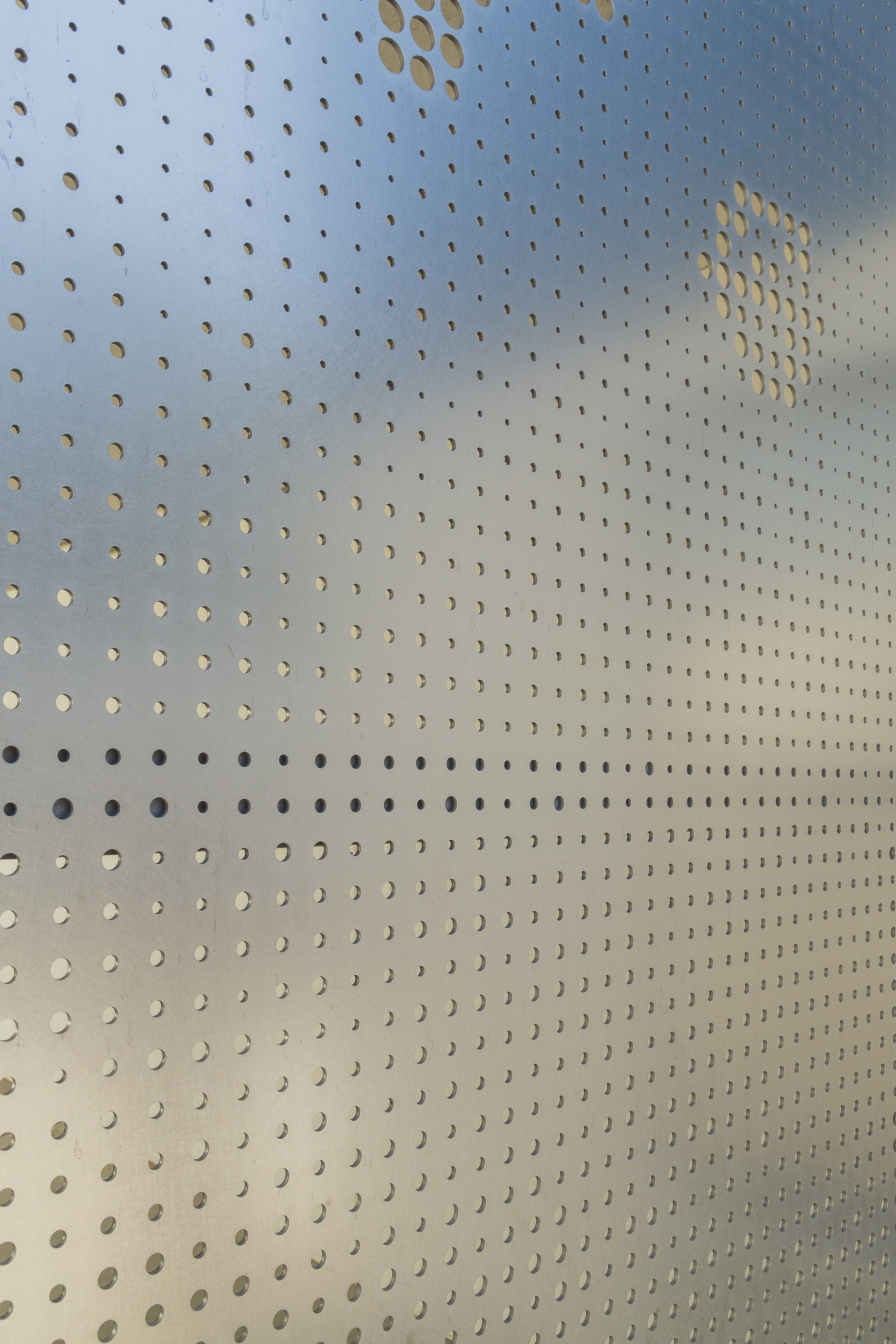 Detail of perforated stainless with Angel Hair finish at Washington Elementary.