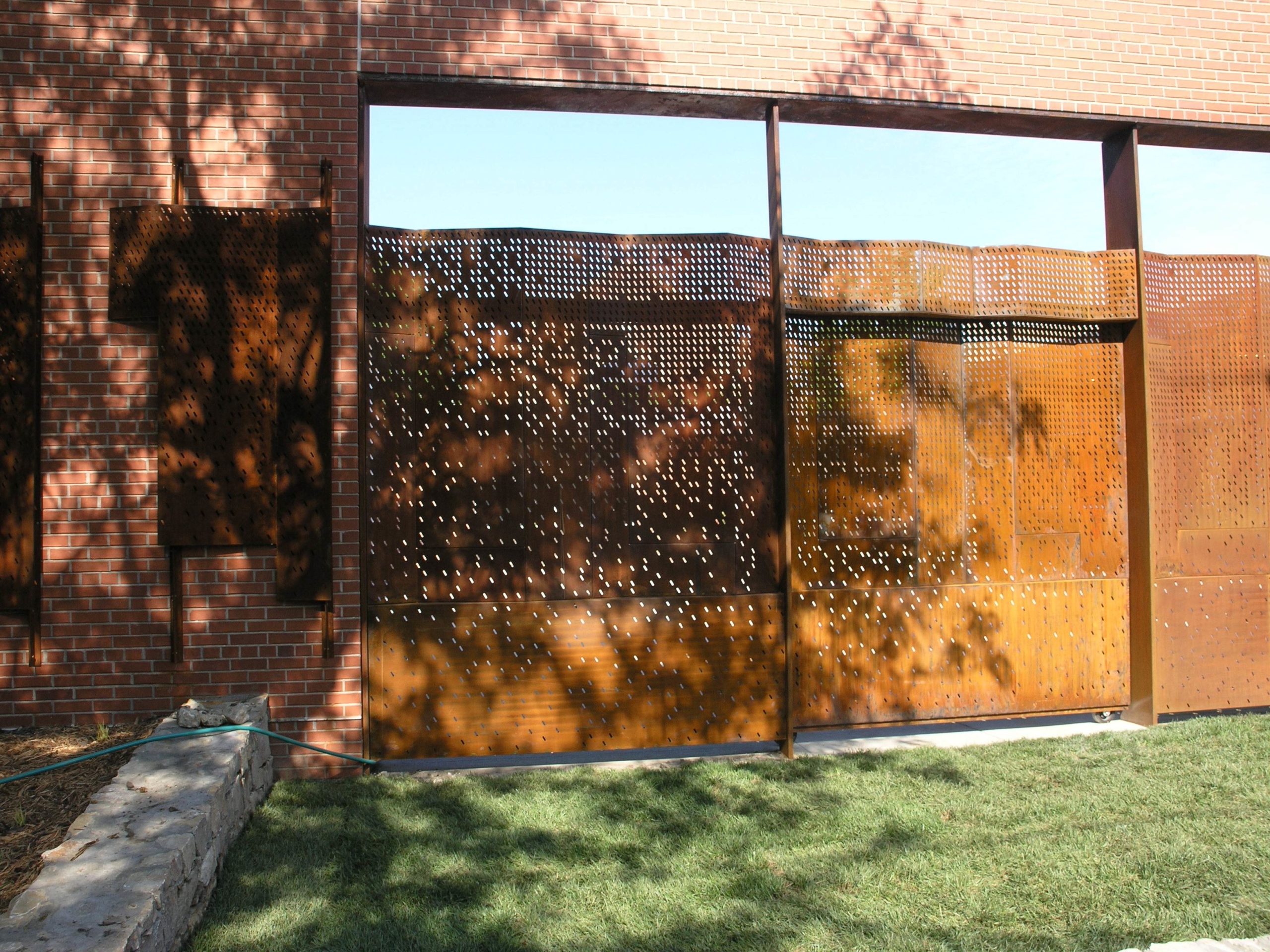 The large gate provides a sense of privacy while allowing for open events at the school. 