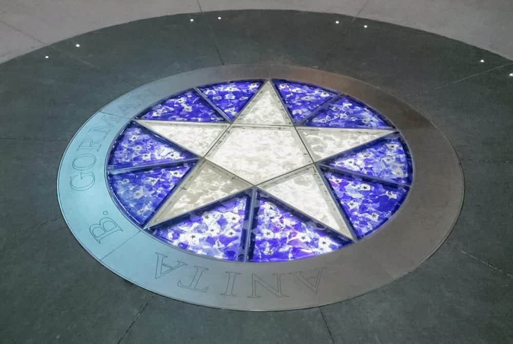 Starlight Theatre Donor's Circle, featuring inset glass with floor and ceiling metalwork.