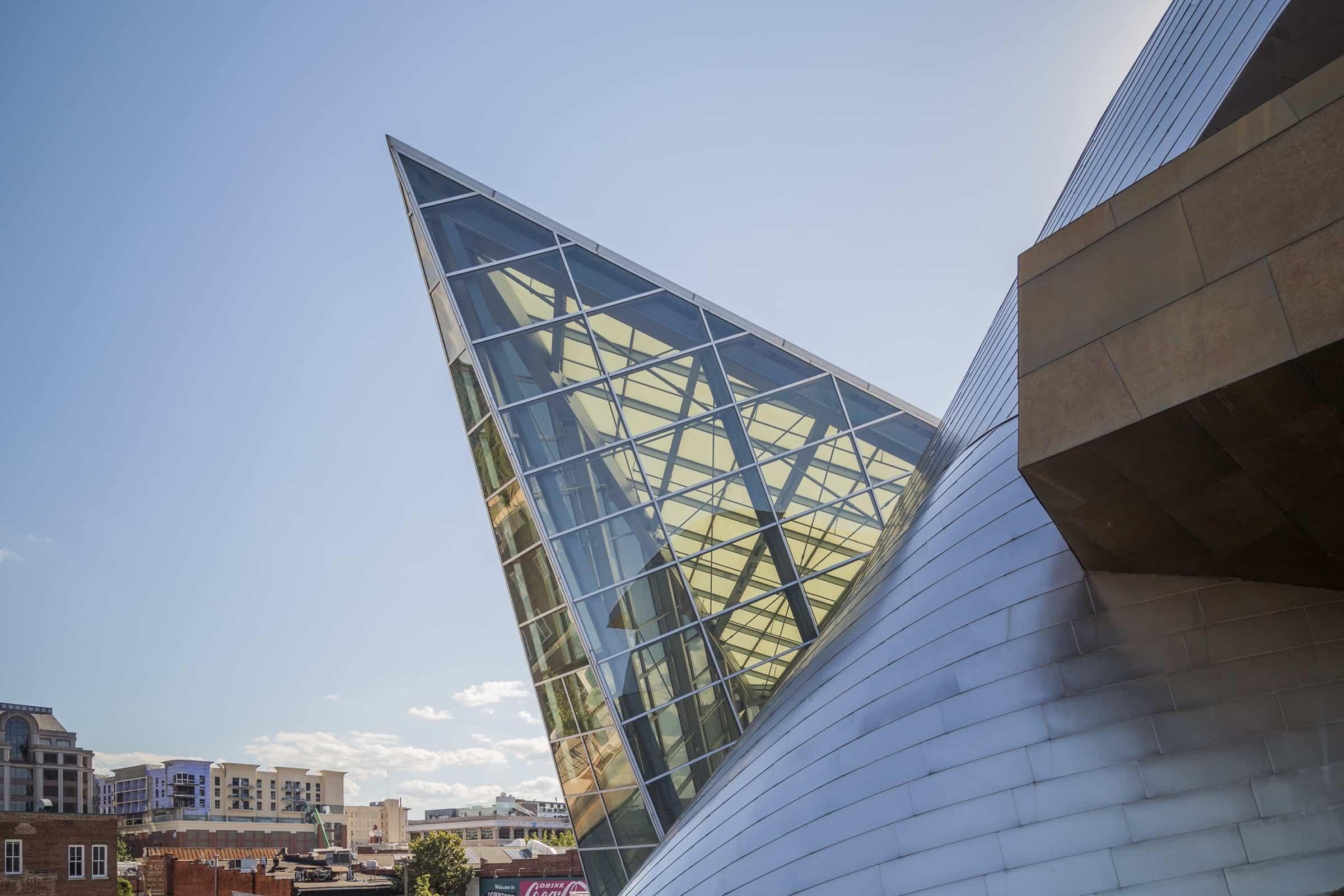 Detail of the Taubman Museum's glass, steel, and zinc facade and building enclosure.