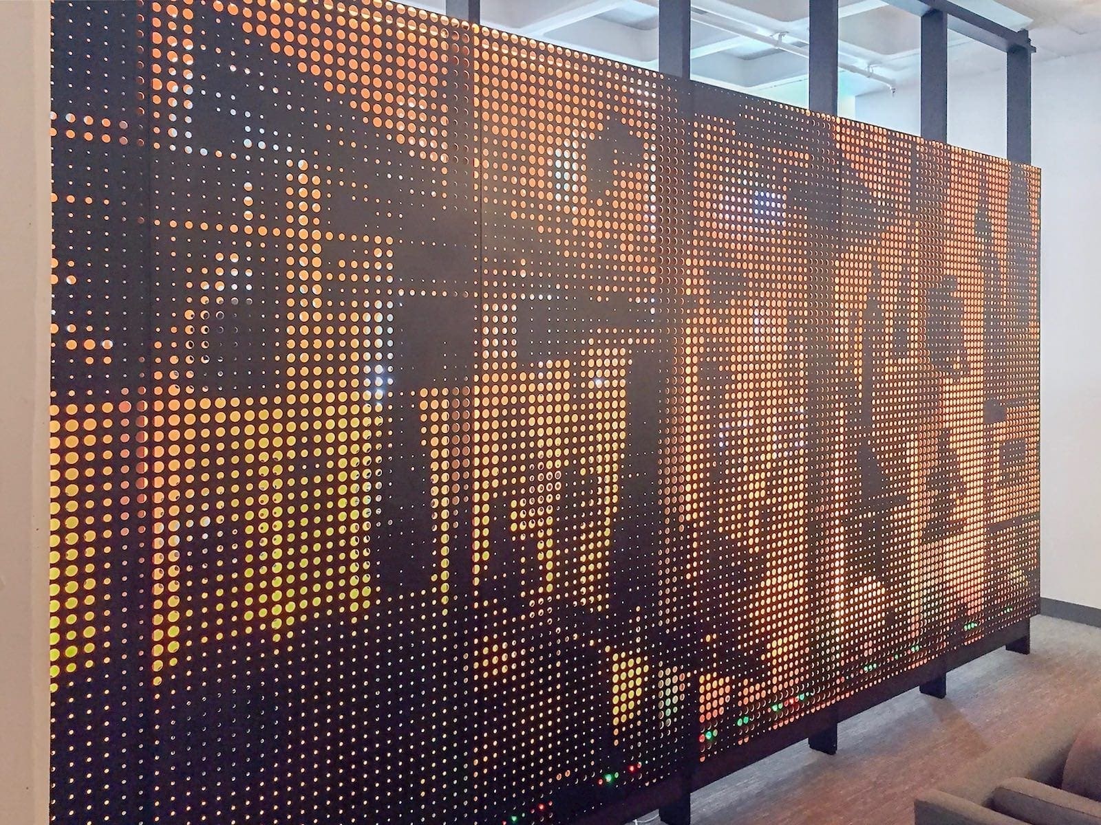 Screens and wall panels in painted aluminum for the Twitter corporate office in San Francisco.